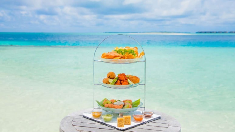 Komandoo Maldives Island Resort - Tap to explore photos