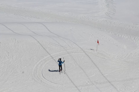 Experience Skiing amidst Snow-Clad Mountains