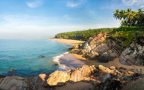 Watch a Sunset at Kovalam Beach